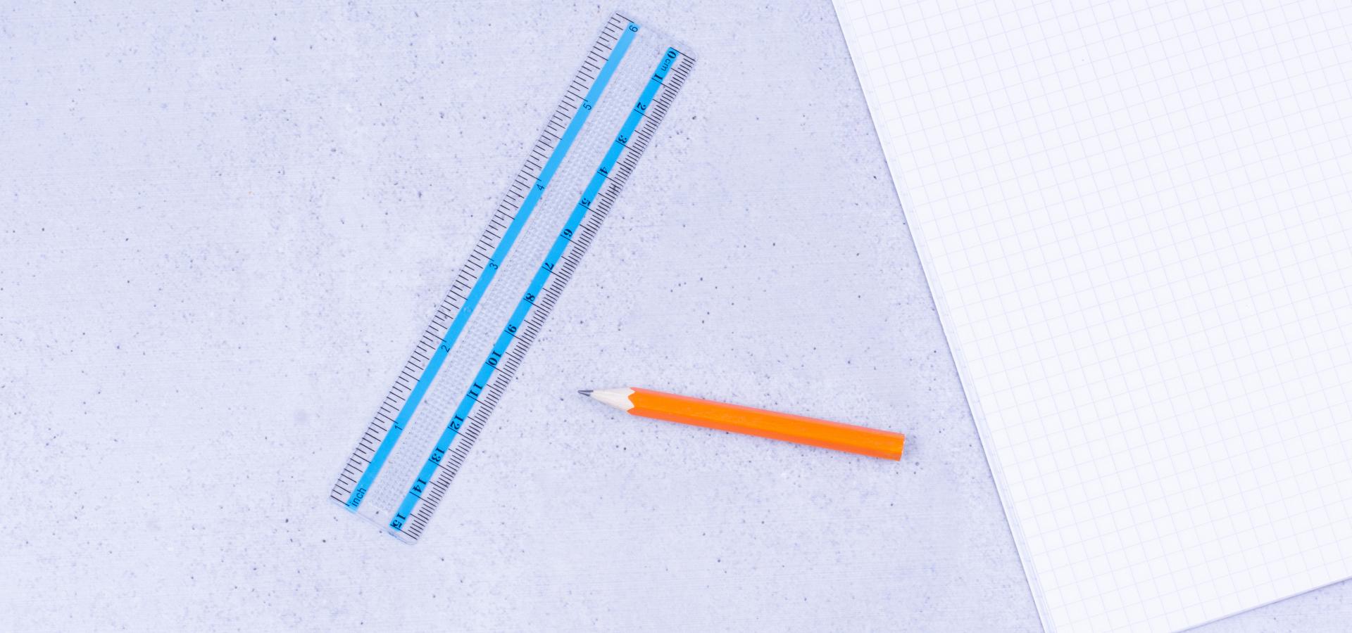 blank notebook with ruler pens around(1)