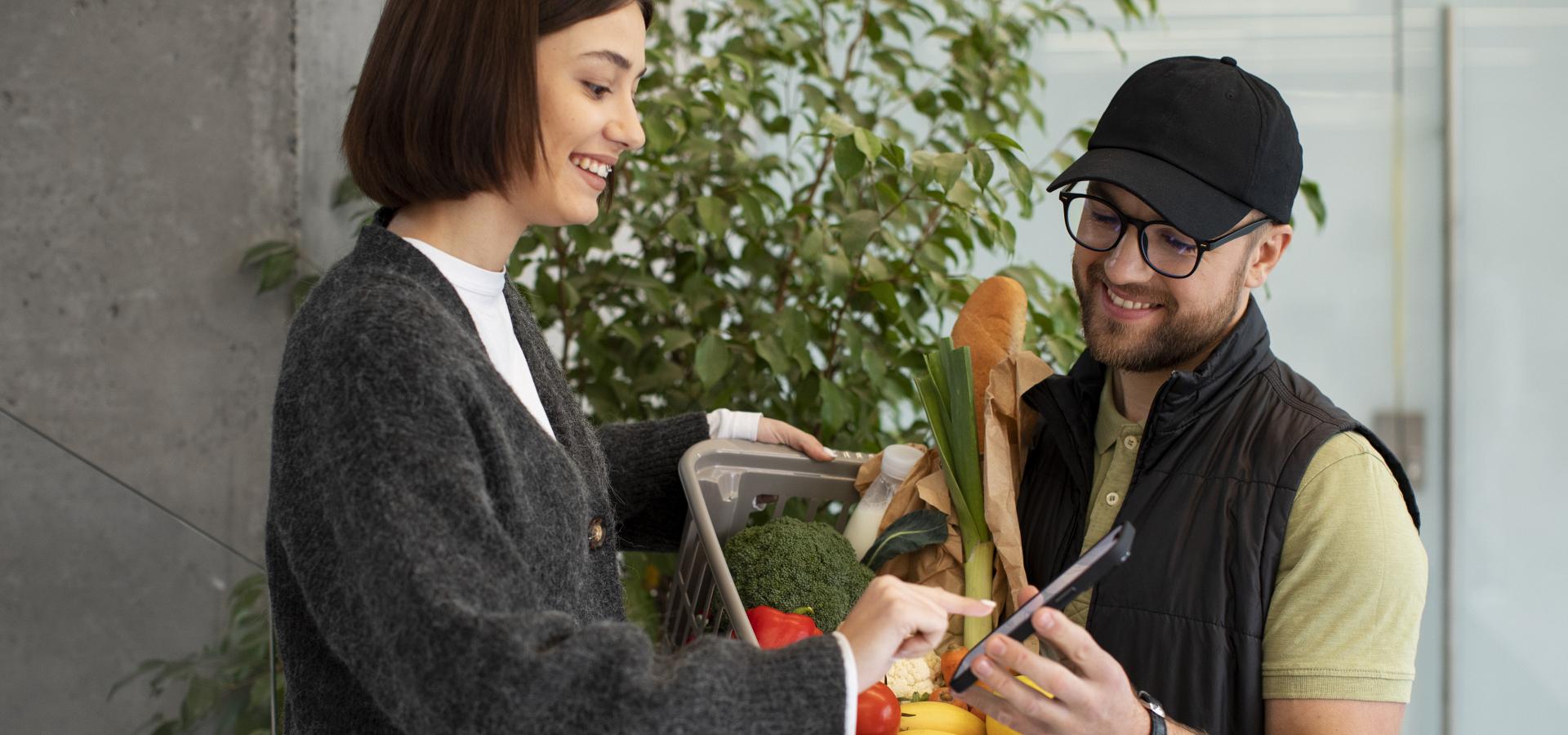 delivery man giving groceries order customer(1)